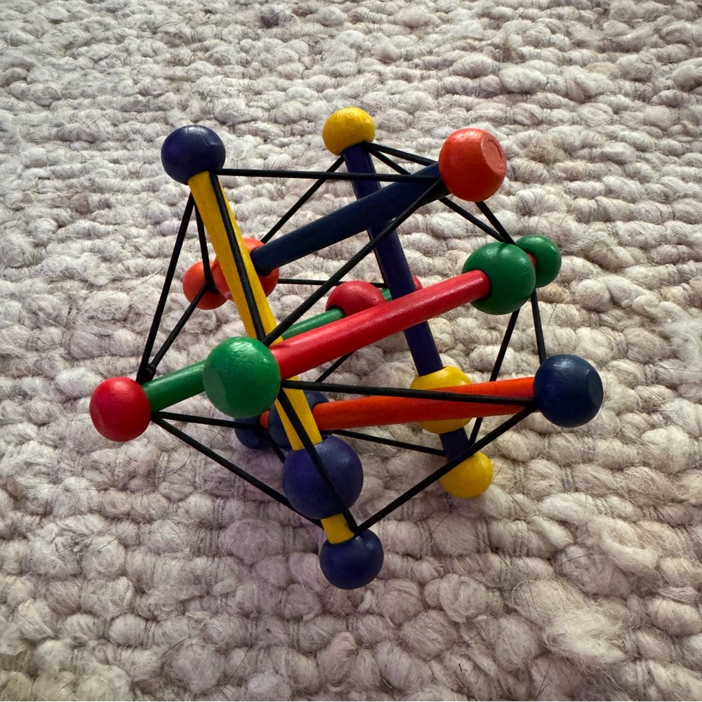 Manhattan Toy Skwish Classic Rattle and Teether Grasping Activity Toy